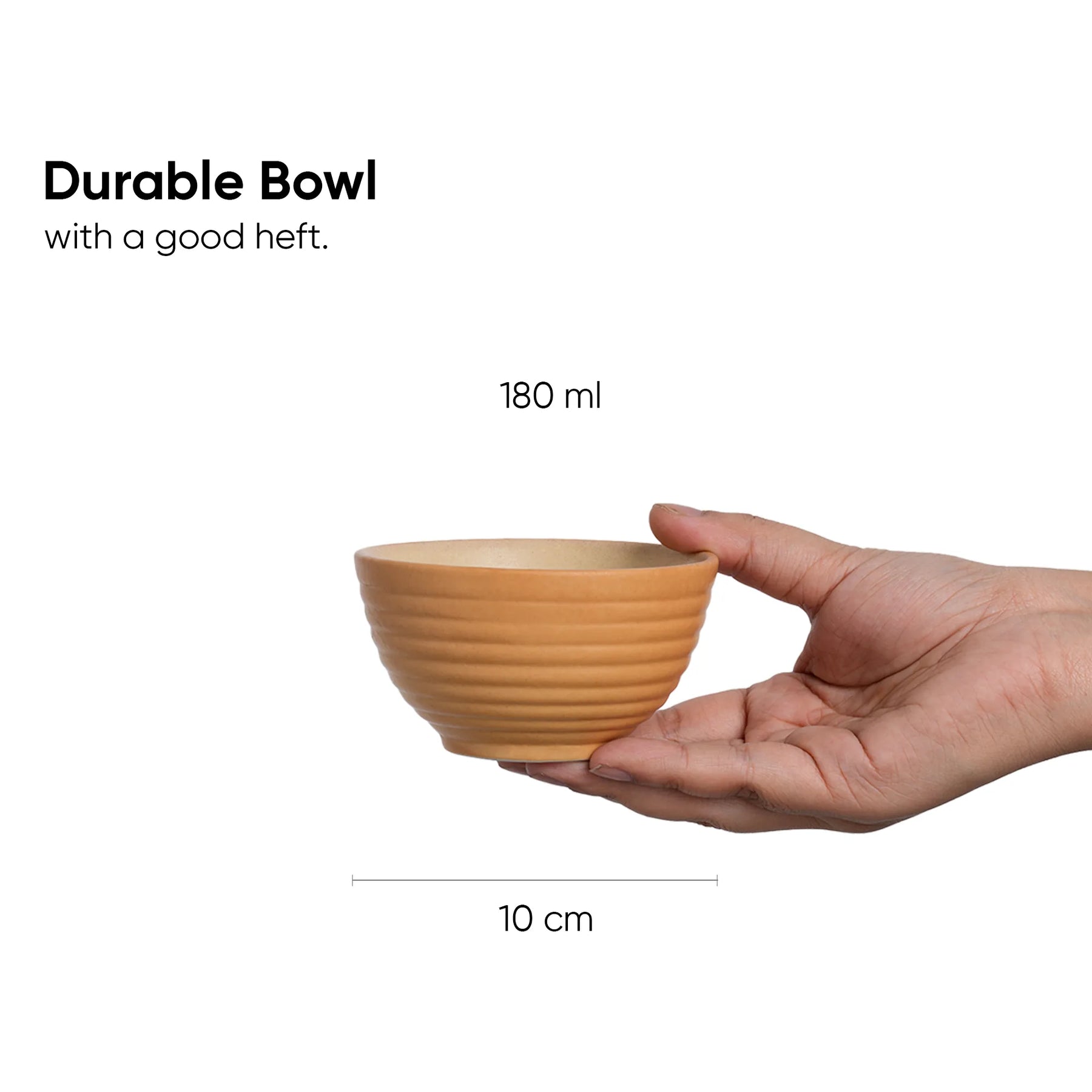 Hand holding a durable bowl with measurements on a white background