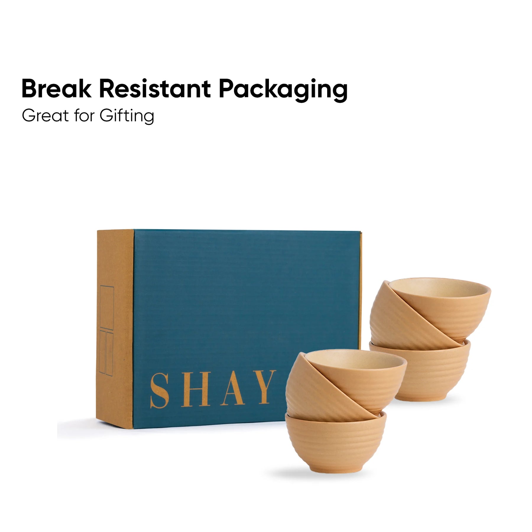 Set of wooden bowls with a 'SHAY' branded box on a white background
