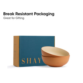 Wooden bowls with 'SHAY' branded packaging on a white background