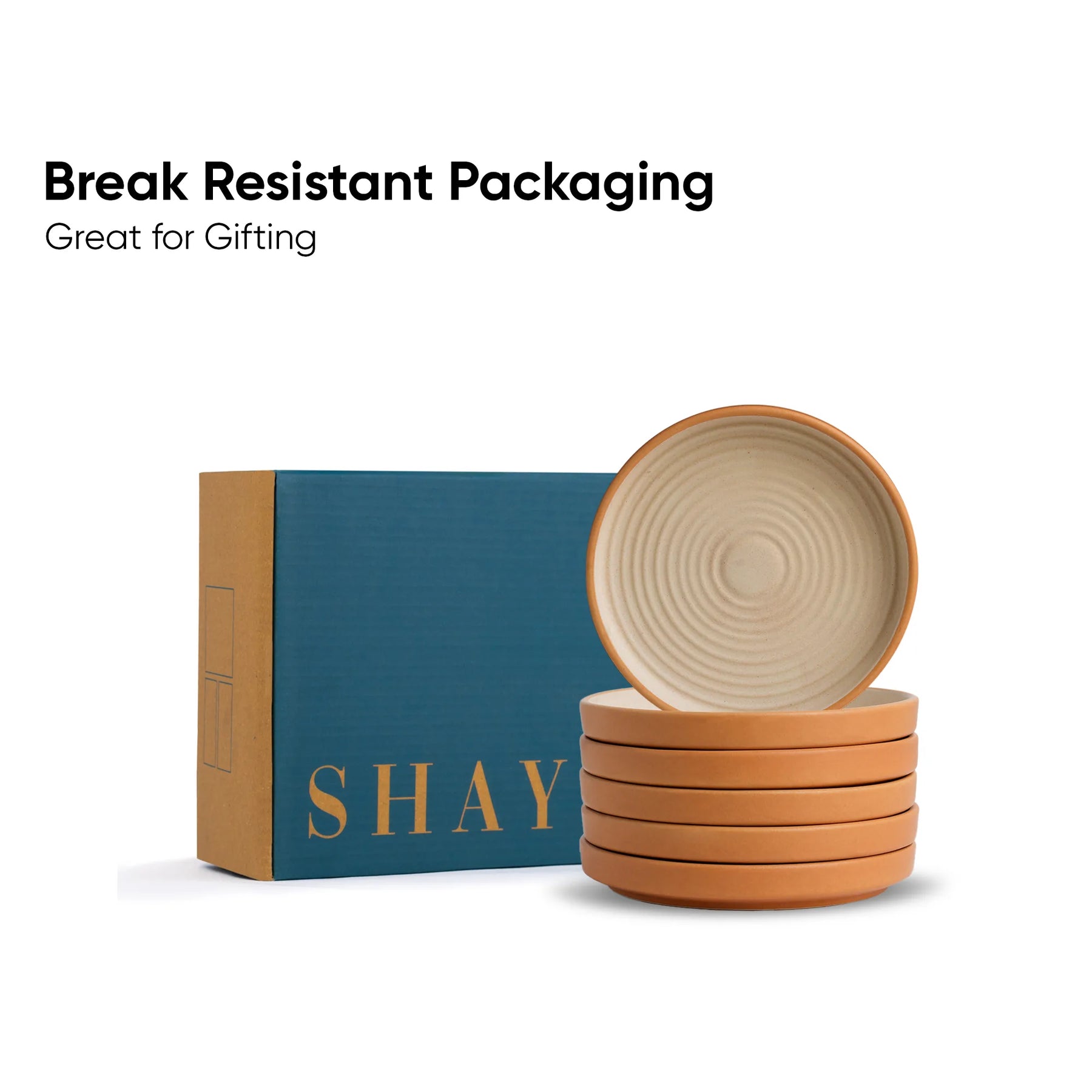 Stack of ceramic bowls with a 'SHAY' branded box on a white background