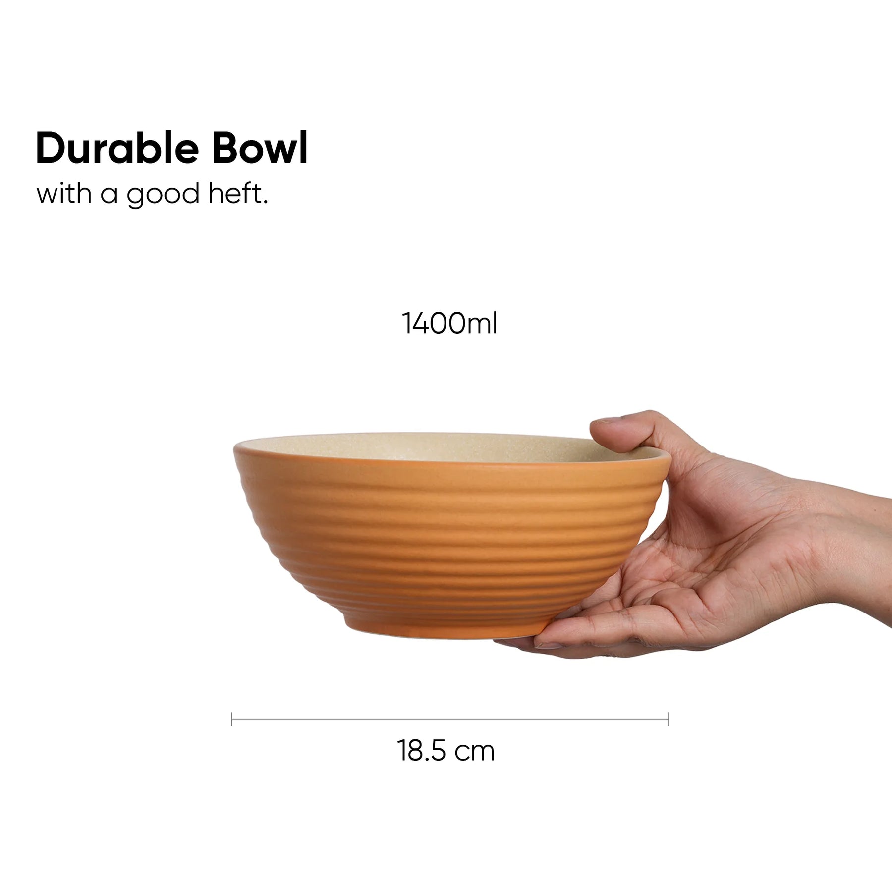 Hand holding a durable bowl with measurements on a white background
