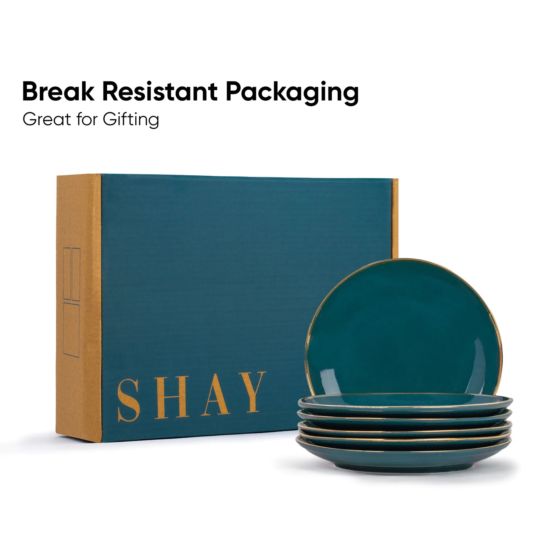 Set of teal ceramic plates with 'SHAY' branding and break-resistant packaging on a white background.