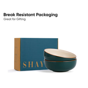 Two green bowls with beige interior and 'SHAY' branding on a white background.