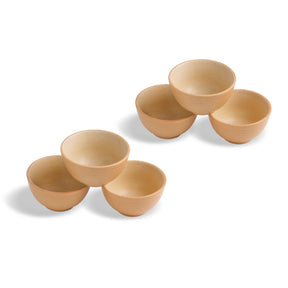 Set of six wooden bowls on a white background