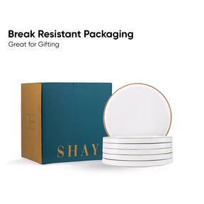Stack of white ceramic plates with 'SHAY' branding on a teal box against a white background.