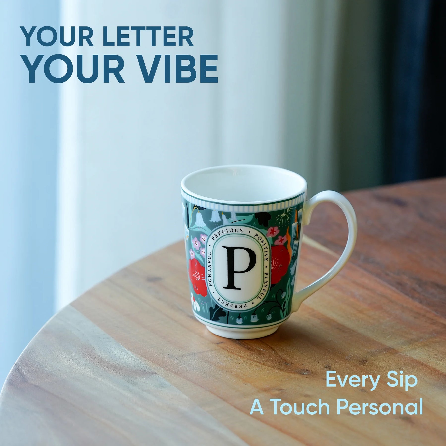 Decorative mug with letter 'P' on a wooden surface, text 'Your Letter Your Vibe' and 'Every Sip A Touch Personal'.