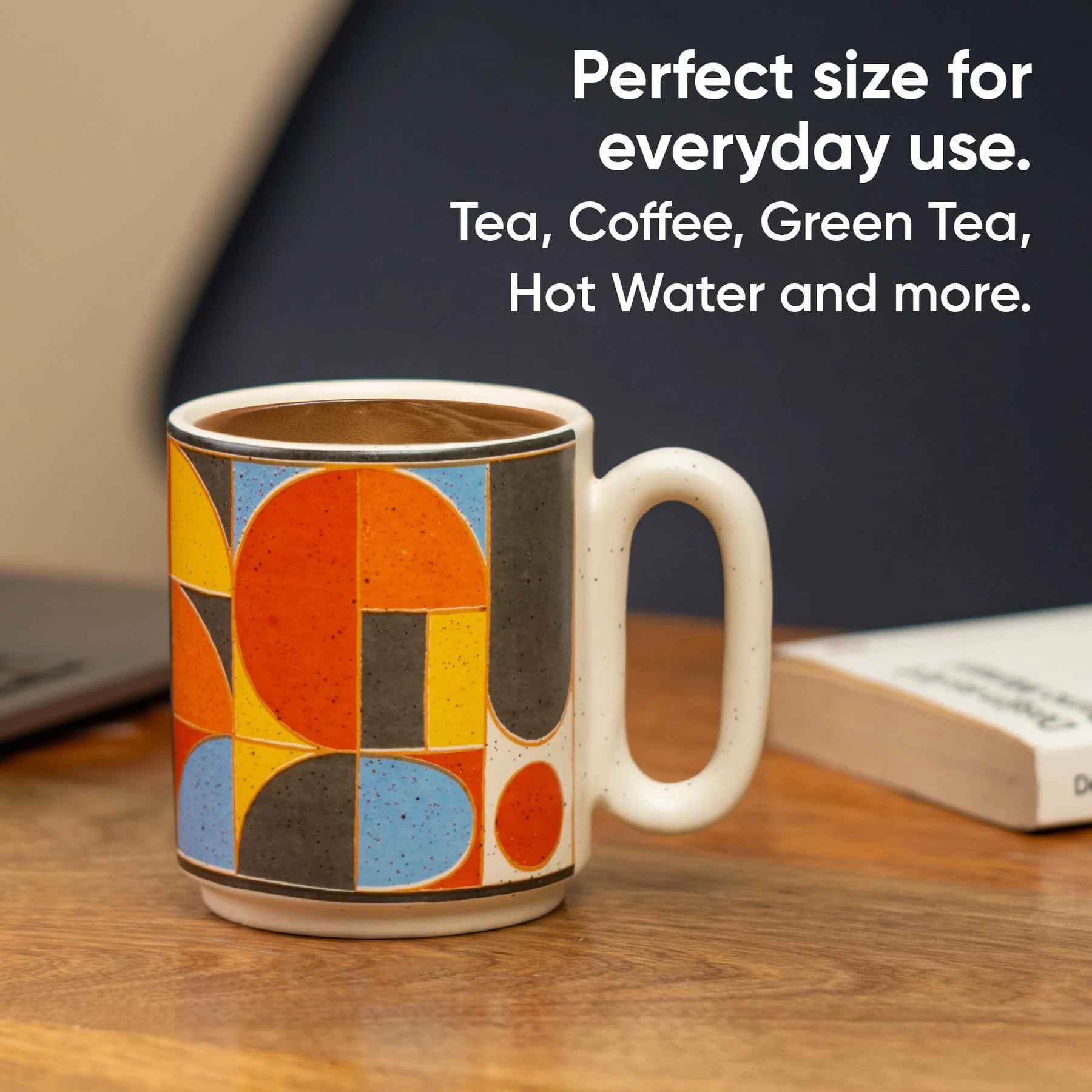 Colorful mug with geometric design on a wooden surface, text about use cases.