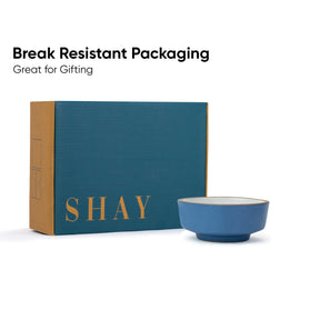 Blue bowl and packaging with 'SHAY' branding on a white background