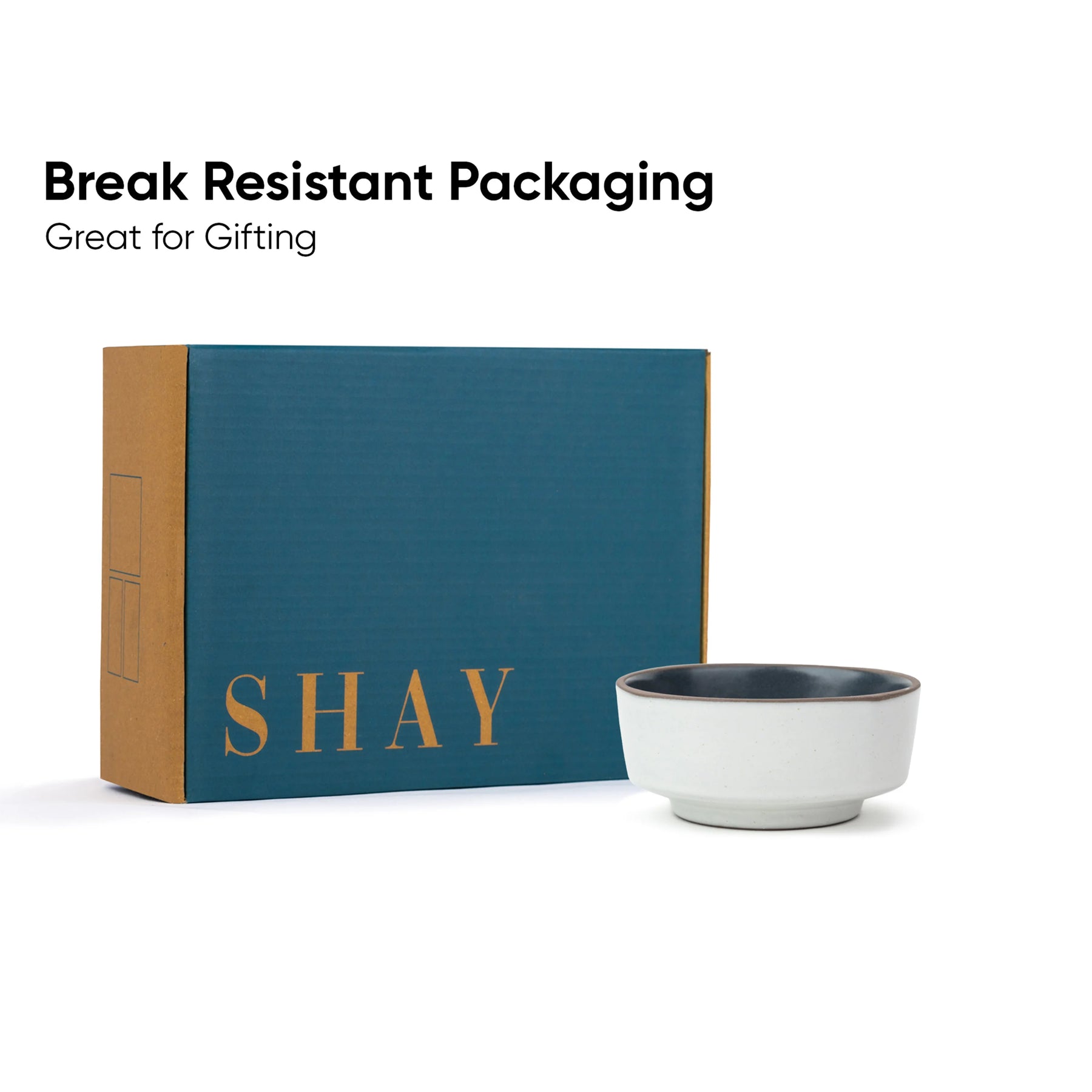 Teal box with 'SHAY' branding and a white bowl on a white background