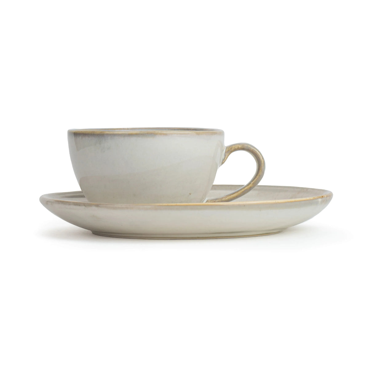 Ceramic cup and saucer set on a white background
